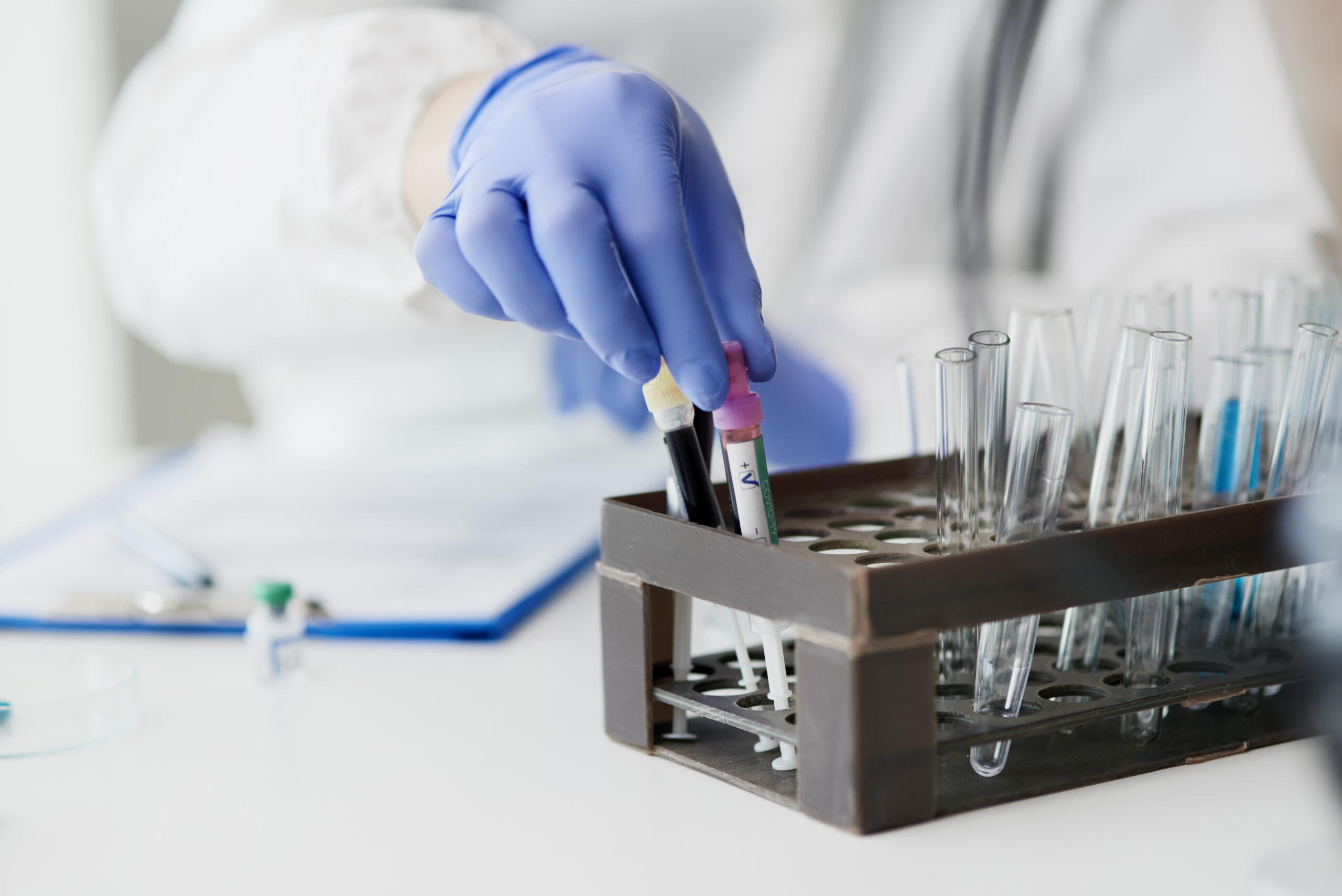 desk at laboratory with test tubes